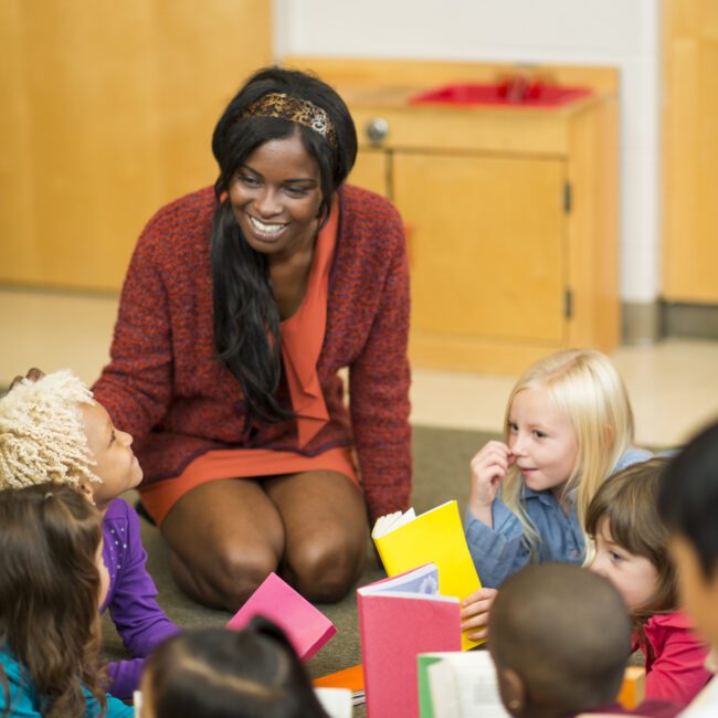 Multi-ethnic group of preschool students in classroom